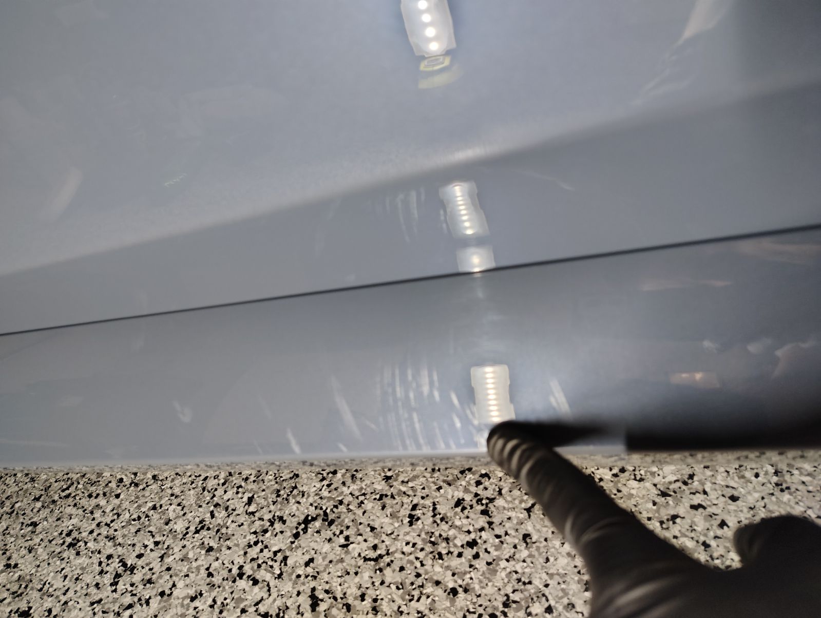 Acura with severely oxidized, hazy headlight - before